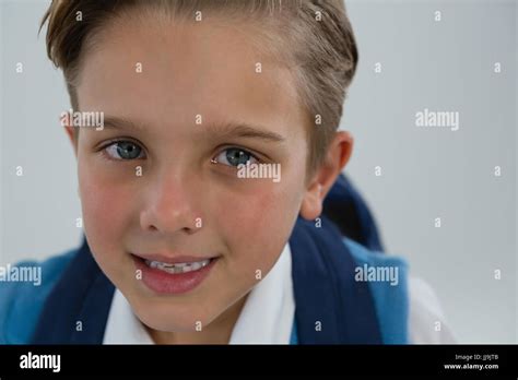 Close Up Of Smiling Schoolboy Looking At Camera Stock Photo Alamy