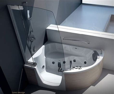These tubs don't require the long wall space that this design also frees up more space that can be used for a separate shower enclosure and more storage. modern shower furniture: Modern Corner Bathtub With Shower ...