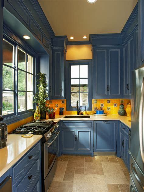 If you are looking for a lighter look, try a soft lavender shade on your kitchen walls and paint your kitchen cabinets white. Blue Kitchen Cabinets | Houzz