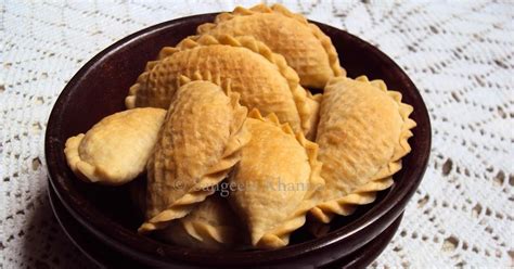 Baked Gujhia Recipe A Puff Pastry Stuffed With Dehydrated Milk And