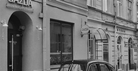 Antique Car in Front of a Building · Free Stock Photo