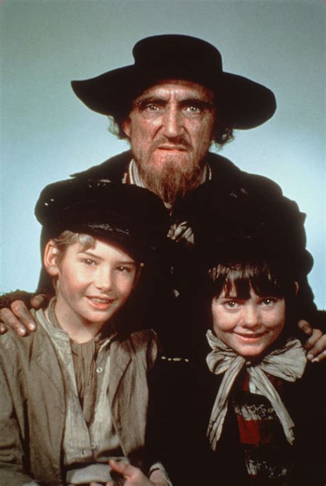 Musical adaptation of charles dickens' oliver twist, a classic tale of an orphan who runs away from the workhouse and joins up with a group of boys headed by the artful dodger and trained to be. Mark Lester, Ron Moody and Jack Wild in Oliver! (1968 ...
