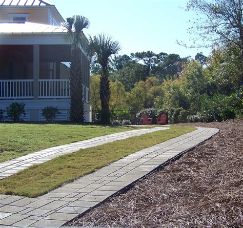 Permeable Paver Driveway In The Tread Style Installed And Designed By