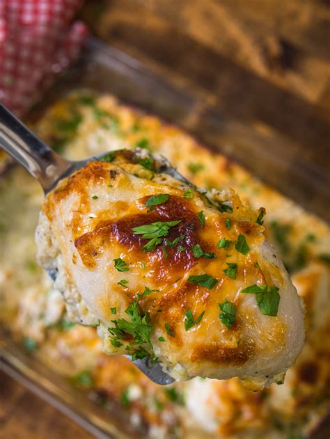 Spread the cheese mixture over the chicken, sprinkle with mozzarella and remaining parmesan cheese. Smothered Sour Cream Chicken - Live Play Eat