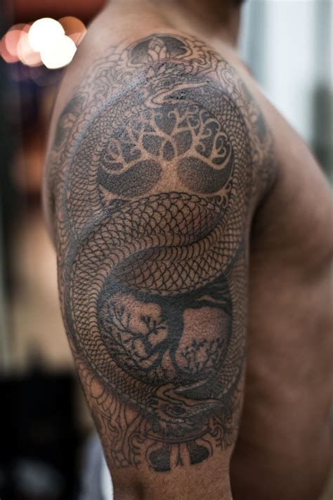 It is a symbol of a snake, serpent or a dragon eating their tail. Ouroboros tattoo | Ouroboros tattoo, Occult tattoo ...