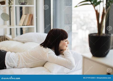 Woman Relaxing On Bed And Looking Out Panoramic Windows Stock Image Image Of Pretty Cute