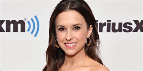 Lacey Chabert Wears The Brightest Christmas Red Dress To Promote Her