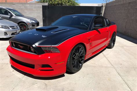 The 2014 ford mustang sits near the top of our sports car rankings. 2014 FORD MUSTANG GT CUSTOM COUPE