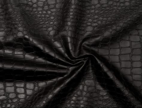 The patterns are not completely uniform. MJTrends: Crocodile Fabric: Black
