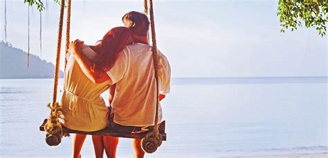 Romantic Holidays Honeymoon Affectionate Couple On Beach On Swing