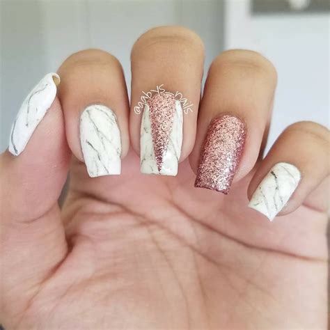 Plus, the unique outline will set you apart. Marble & rose gold | Rose gold nails design, Rose gold ...