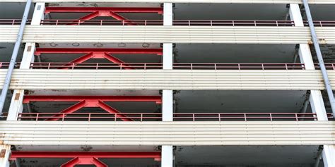 Local Building Balconies Construction With Red Metal Beams Stock Image