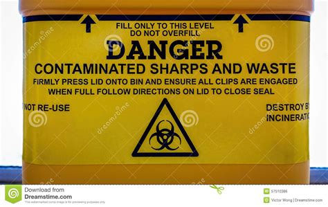 I used some electrical tape i had lying around, i taped the main part of the bottle, but left a part for the label. Warning Label On A Sharps Bin Stock Photo - Image of healthcare, label: 57510386