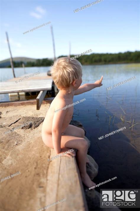 Naked Boy Sitting At Lake Sweden Stock Photo Picture And Royalty Free Image Pic Nef