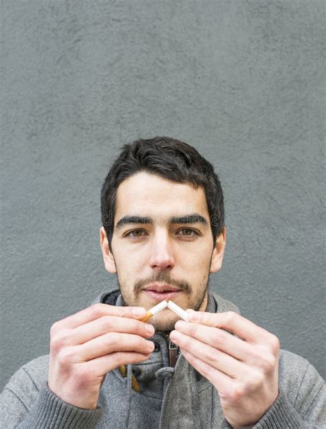 Portrait Of Man Breaking A Cigarette Stock Image Image Of Habit