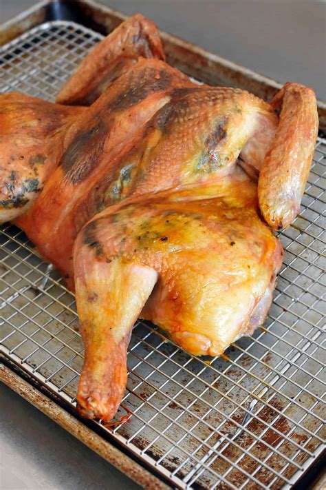 Use kitchen shears to cut out the backbone. Spatchcocked Chicken with Herb Butter - Nom Nom Paleo®