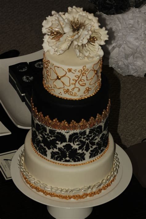 I want to show you my very first wedding cake! Wedding Cake Black&white Silver-Gold - CakeCentral.com