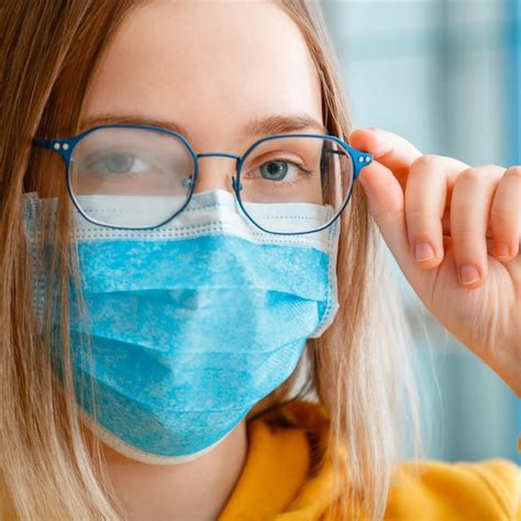 Premium Photo Foggy Glasses Wearing On Young Woman Close Up Portrait Teenager Girl In Blue