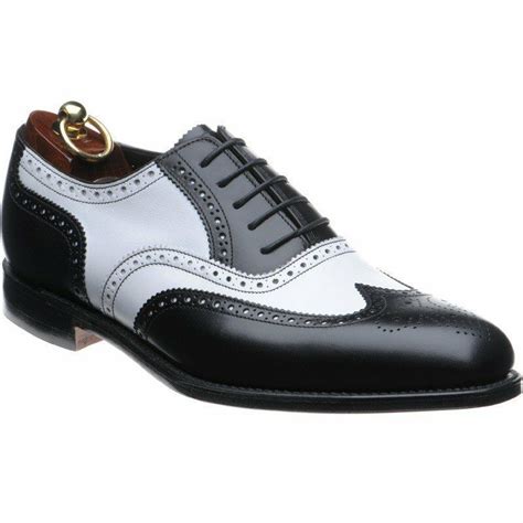 This is the simplest and most versatile pair of shoes you can purchase, especially if you want something you can wear with a suit. Mens Formal Shoes, Men Black Wing Tip Two Tone Spectator ...