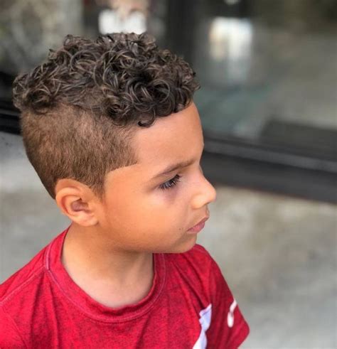 Cornrow bun courtesy of hairstyles for black boys with long hair. If your little boy has a curly hair, then this fabulous kids hairstyle plan give... | Kids curly ...