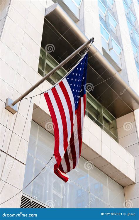 American Flag Waving Against Modern Office Building Stock Image Image