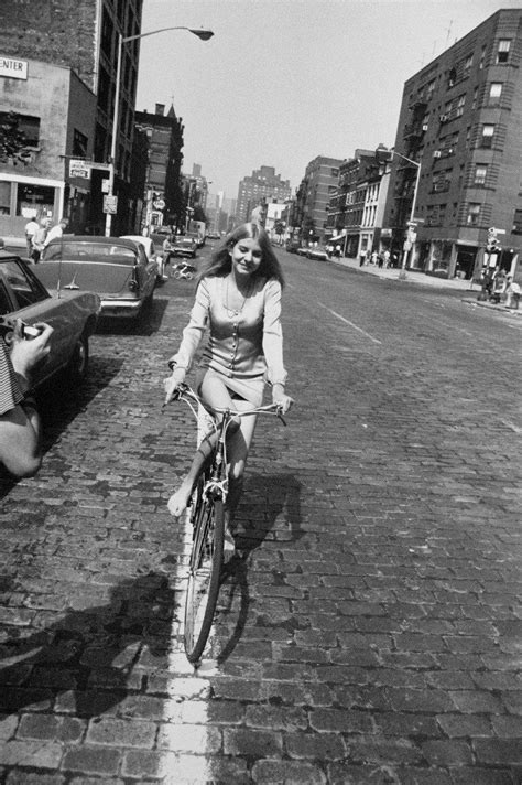 Garry Winogrand Woman Riding Bicycle From The Women Are Beautiful