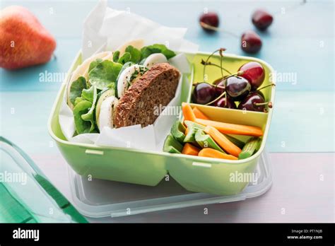 Healthy School Food In A Lunch Box Vegetarian Sandwich With Cheese Lettuce Cucumber Egg And