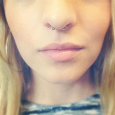 Septum Piercing With Small Curved Barbell Nasenpiercing