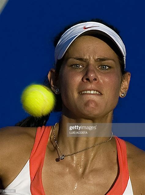 German Tennis Player Julia Goerges Looks At The Ball As She Returns
