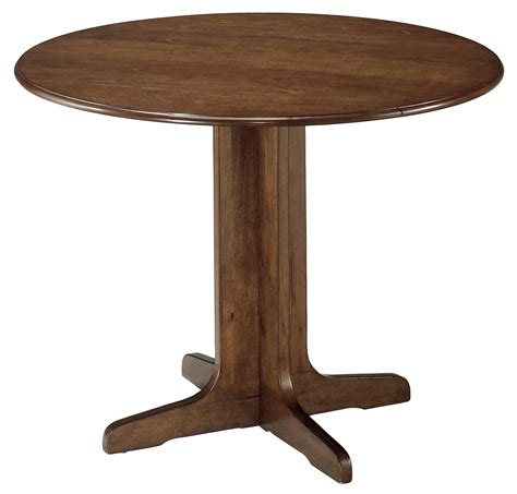 Timeless and charming, add a traditional, oak drop leaf dining table to your home. Ashley Furniture Signature Design Stuman D293-15 Round ...