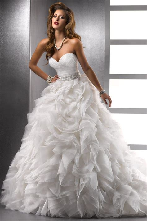 A Grand Statement Of Breathtaking Elegance This Ball Gown Features A Deep Sweetheart Neckline I