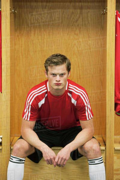 Soccer Player Sitting In Locker Room Stock Photo Dissolve