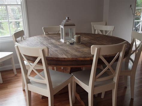 My dad had built a round kitchen table for the house, but it was a bit too massive for my liking, and didn't leave much room for the knees. ikea chairs and table | Round kitchen table, Kitchen table ...