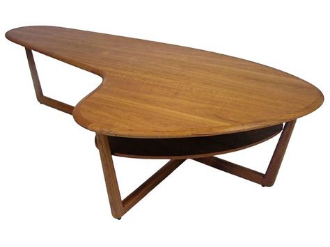 The table comes in an interesting kidney shape that adds to its modern flavor. 1960s Organic Kidney Shaped Teak Coffee Table For Sale at ...