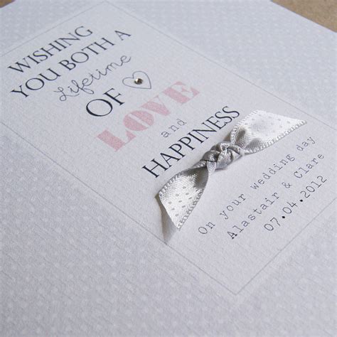 Wedding cards can be personalised with your photos and text on the front, back and inside pages depending on the design. personalised wedding card by button box cards | notonthehighstreet.com