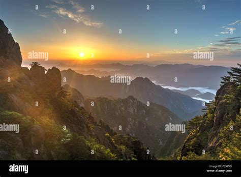 Colourful Sunrise Over Sea Of Clouds At One Of The Peaks Of Huangshan