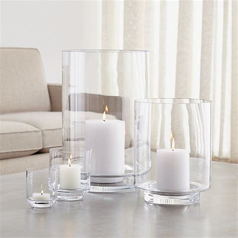 These glass candle holders will delight every passionate beachcomber. Taylor Glass Hurricane Candle Holders | Crate and Barrel