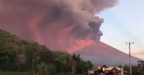 Explosion from two craters, lava flow, and continuous eruptions of anak krakatau; Indonesia: Mount Agung volcano in Bali erupts and tourists ...