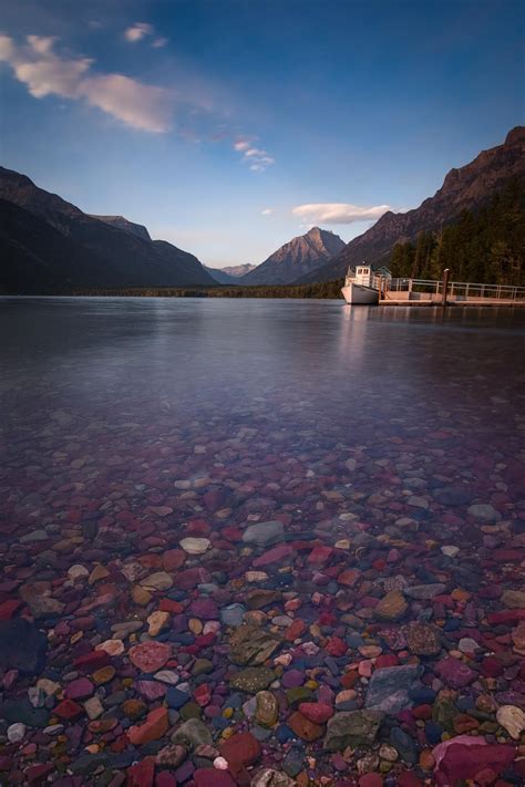 Colorful Pebbles Line The Shores Of Lake Mcdonald In Glacier National Park Montana Usa