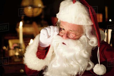 Portrait Of Santa Claus Winking Stock Photo Dissolve