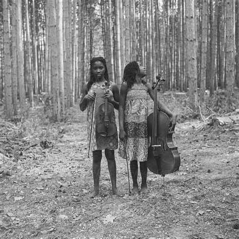 Two Black Girls With Cello And Violin By Gabriel Gabi Bucataru Duo