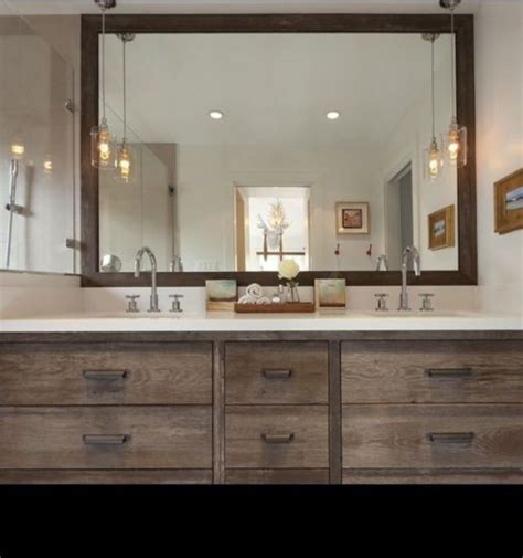 Hanging a bathroom mirror looks tricky and complicated, right? How High to Hang a Vanity Mirror | Sparrow & Stoll