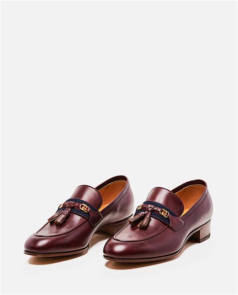 Gucci Paride Webbing Trimmed Tasselled Leather Loafers In Brown Modesens