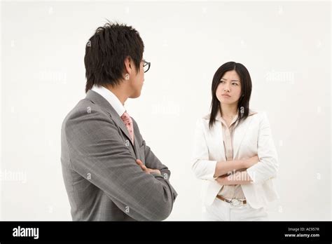 Two Business People Glaring At Each Other Stock Photo Alamy