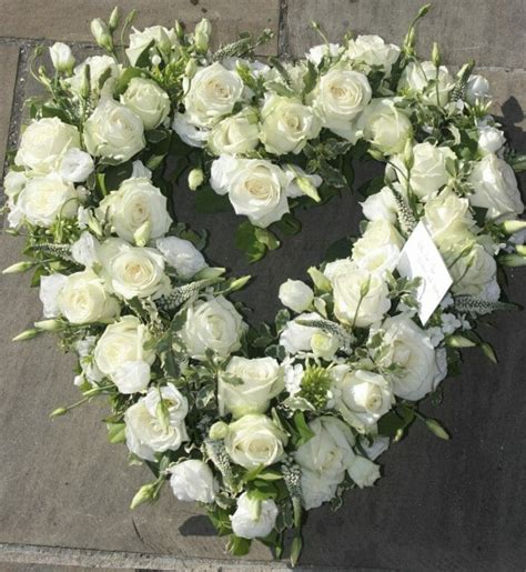In the buddhist culture, white flowers are appropriate for funerals, but red flowers or food items are considered bad taste. Funeral Flowers Open Heart | Kensington Flowers