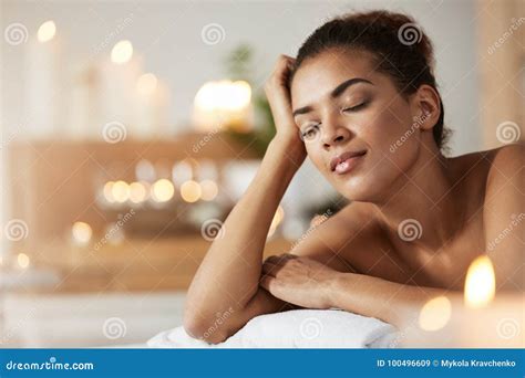 Portrait Of Tender African Girl With Closed Eyes Resting Relaxing In Spa Resort Stock Image