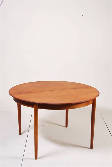 Maybe you would like to learn more about one of these? Round Danish Modern Teak Dining Table by Dyrlund at 1stdibs