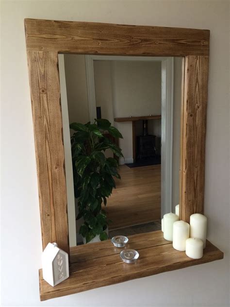 So i measured down from the light fixture to make sure there would be enough room for the mirror and then i set the mirror back in place and attached the other end of the bracket to the top of the frame. *Beautiful quality handmade rustic style wooden mirror ...