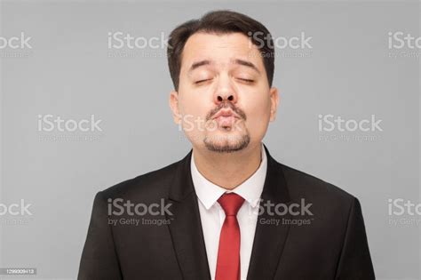 Romantic Man Closed Eyes Sending Air Kiss Stock Photo Download Image
