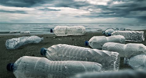 Plastic Water Bottles Pollution In Ocean Stock Photo Download Image